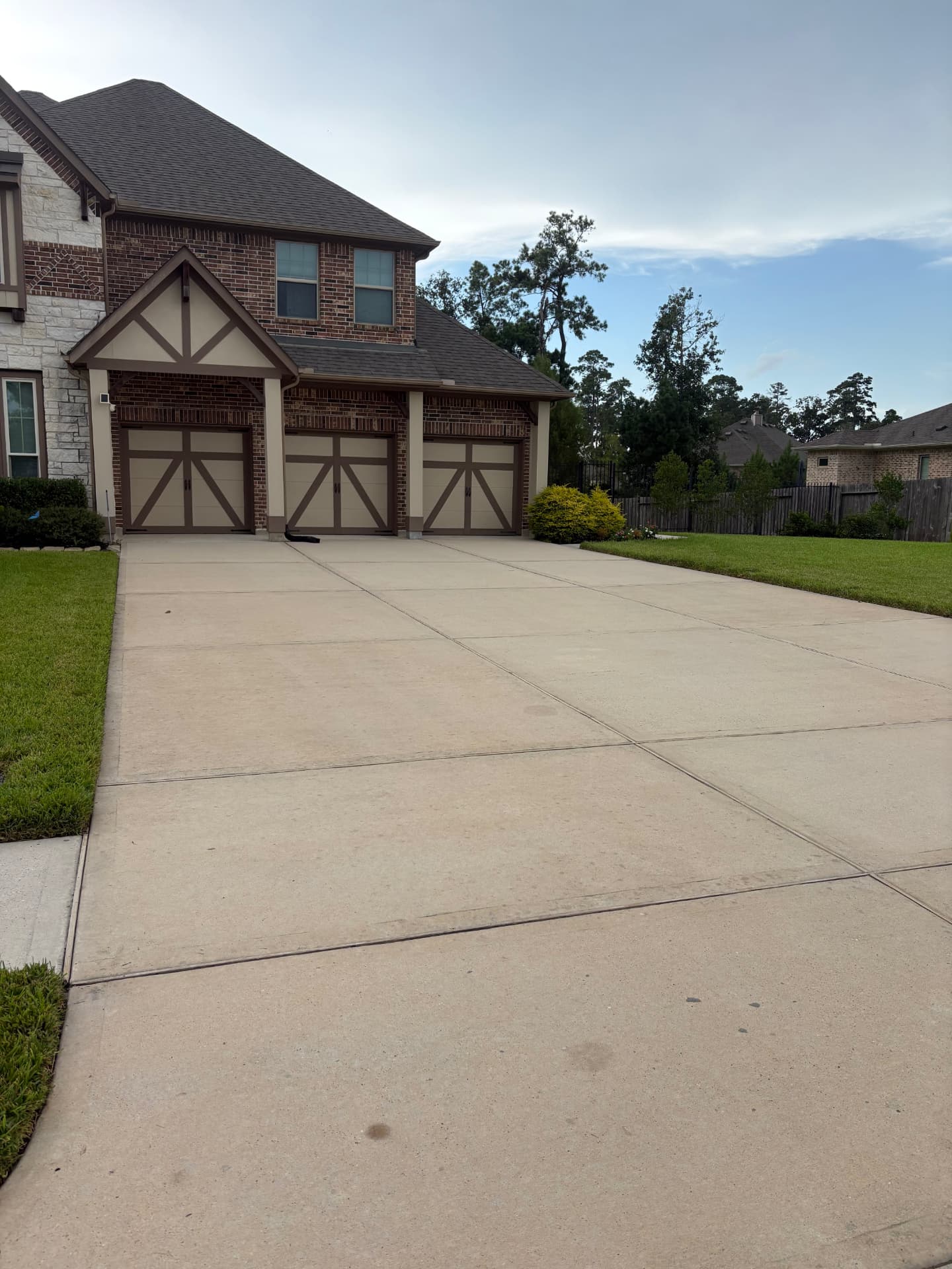Wide clean driveway in front of a home — Integrative Services, Montgomery TX